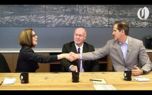 Patrick Starnes shakes hands with Governor Kate Brown