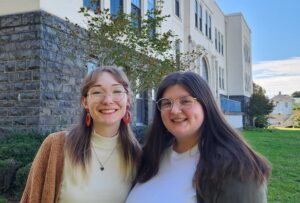 Josie and Emily stand outside of Towler Hall