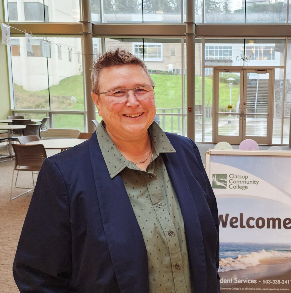 Photo of Beth van Elswyk standing in Towler Hall at CCC