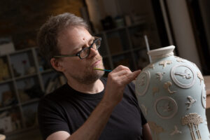 CCC Instuctor Brad Menninga creating a ceramic vase